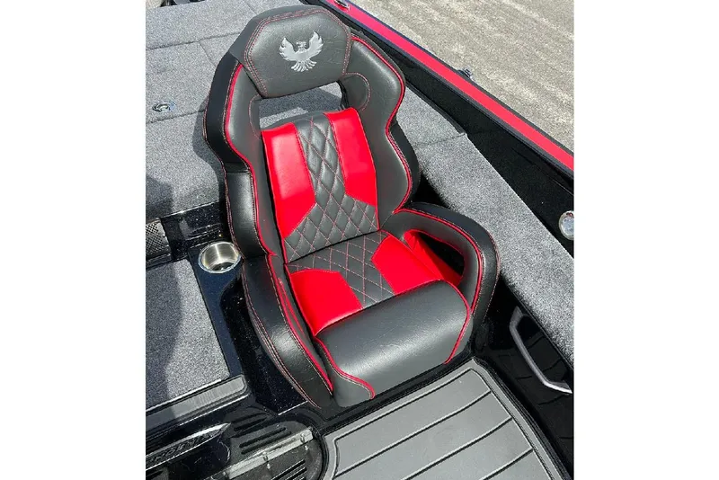 Slide: The Image of Red and black seat in 2026 Phoenix 921 Elite X boat, featuring diamond stitching. - 31