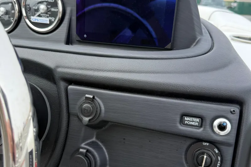 Slide: The Image of Dashboard of 2026 Berkshire 24 RFX CTS with gauges and power controls. - 15