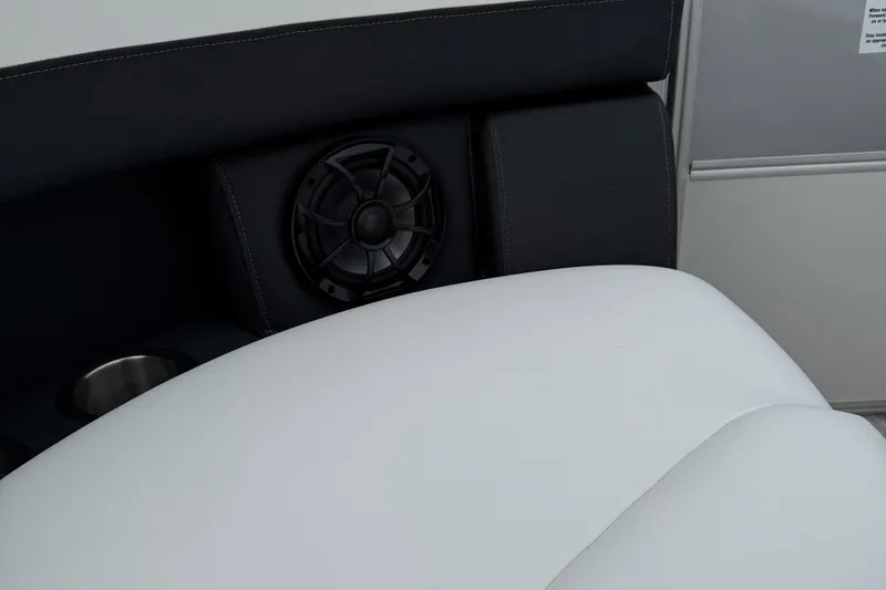 Slide: The Image of 2026 Berkshire 24 RFX CTS interior with speaker and cup holder detail. - 16