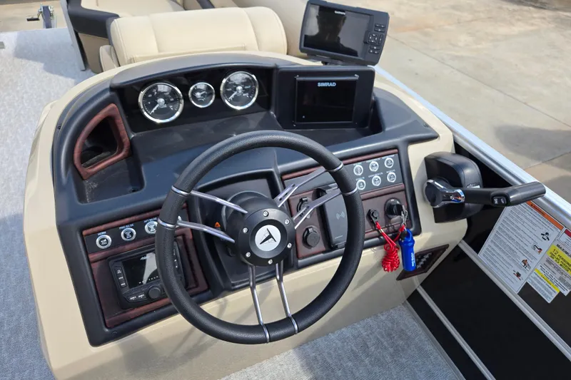 Slide: The Image of Steering console of 2021 Trifecta SS 23C 2.75 boat with gauges and controls. - 8