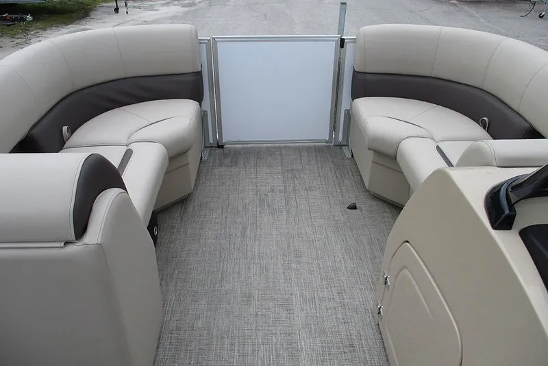 Slide: The Image of 2026 Bentley Pontoons Legacy 200 Navigator interior with plush seating and modern design. - 10