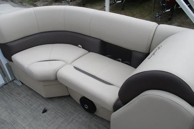 Slide: The Image of 2026 Bentley Pontoons Legacy 200 Navigator interior seating with beige and brown upholstery. - 20