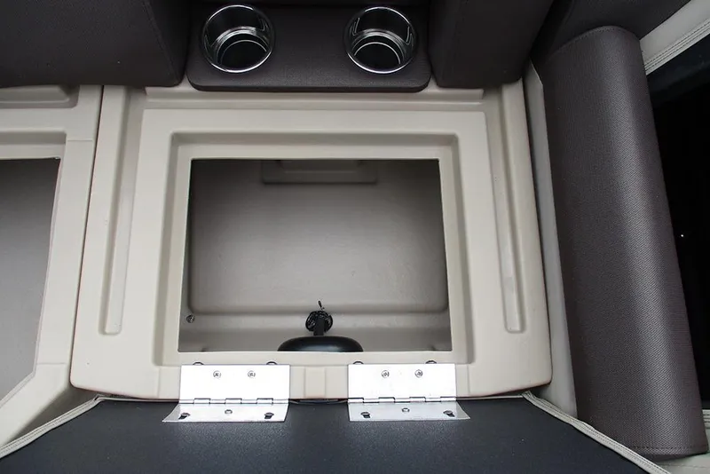 Slide: The Image of 2026 Bentley Pontoons Legacy 200 Navigator storage compartment with cup holders. - 23