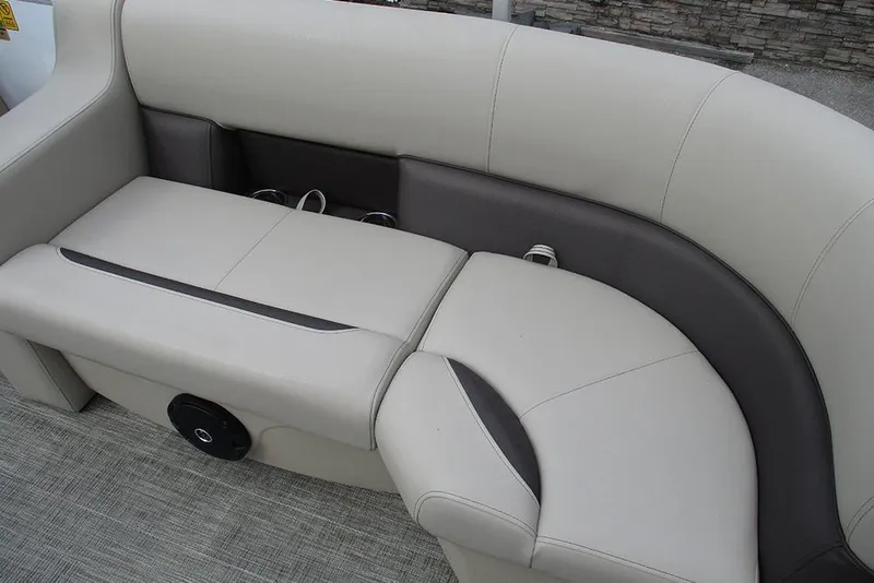 Slide: The Image of 2026 Bentley Pontoons Legacy 200 Navigator interior seating, featuring elegant beige upholstery. - 25
