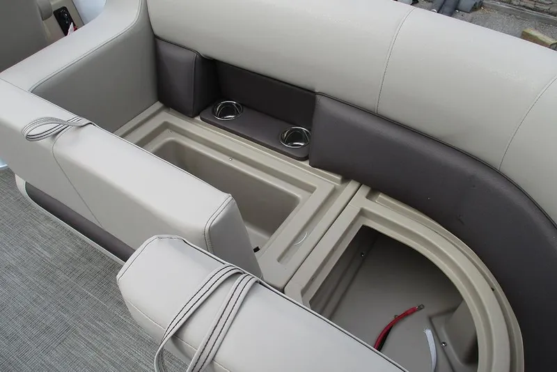 Slide: The Image of 2026 Bentley Pontoons Legacy 200 Navigator seating with storage and cup holders. - 26