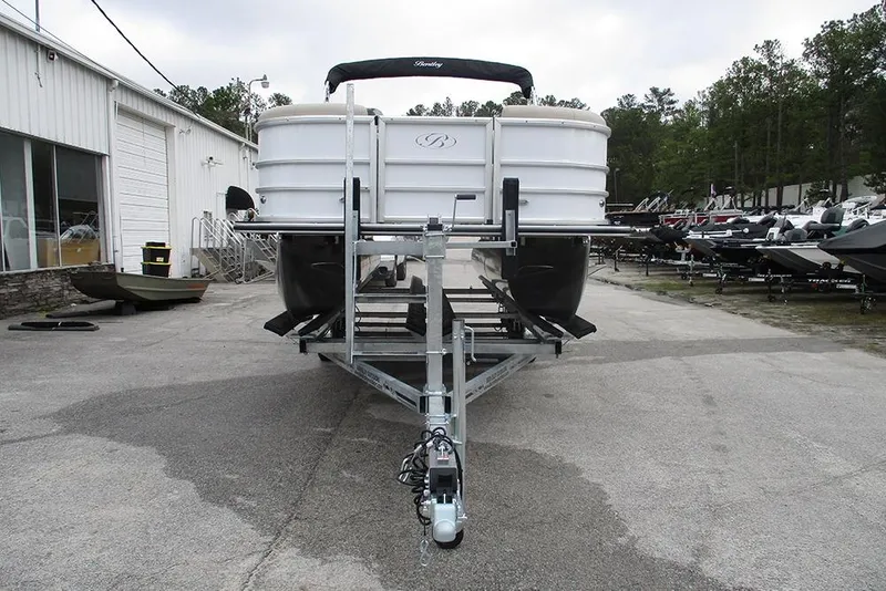 Slide: The Image of 2026 Bentley Pontoons Legacy 200 Navigator on trailer at dealership lot. - 4
