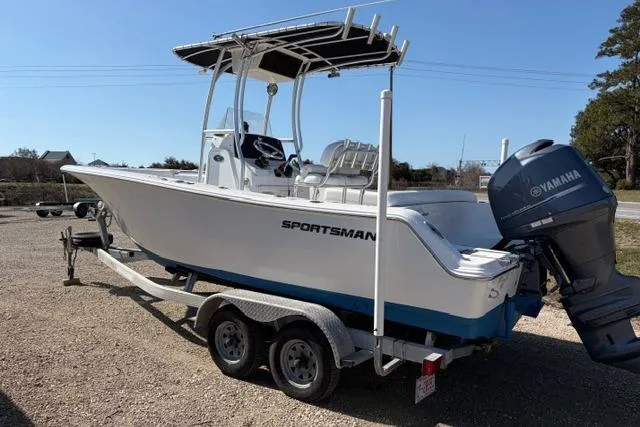 Slide: The Image of 2015 Sportsman Heritage 211 Center Console boat on trailer with Yamaha outboard motor. - 3