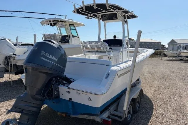 Slide: The Image of 2015 Sportsman Heritage 211 Center Console boat with Yamaha engine on trailer. - 4