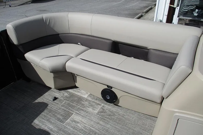 Slide: The Image of 2026 Bentley Pontoons LE 180 CR interior seating with beige upholstery and modern design. - 11