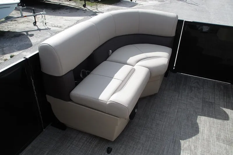 Slide: The Image of 2026 Bentley Pontoons LE 180 CR interior seating, featuring luxurious beige upholstery. - 13