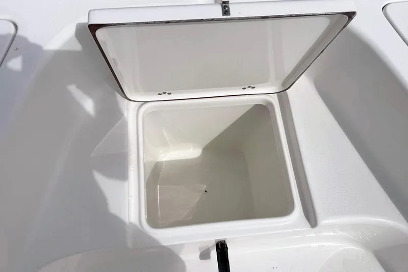 Slide: The Image of Open storage compartment on 2026 Sea Pro 230 Bay boat, showcasing interior space. - 14