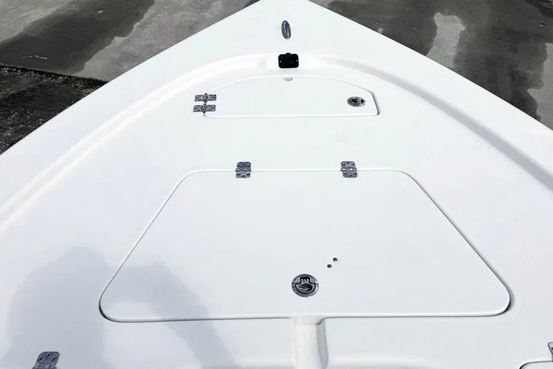 Slide: The Image of Bow deck of 2026 Sea Pro 230 Bay boat with storage compartments. - 16