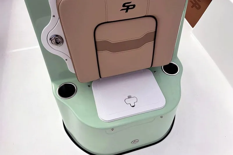 Slide: The Image of 2026 Sea Pro 230 Bay boat seat with cup holders and storage compartment. - 21
