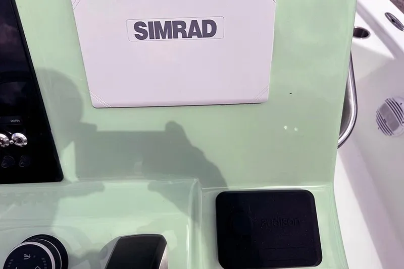 Slide: The Image of Control panel of 2026 Sea Pro 230 Bay boat with Simrad electronics. - 34