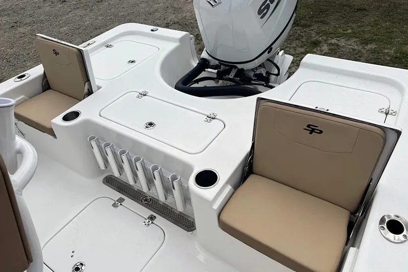 Slide: The Image of 2026 Sea Pro 230 Bay boat interior with seating and rod holders. - 41