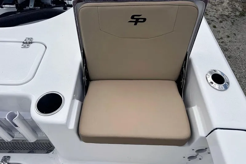 Slide: The Image of 2026 Sea Pro 230 Bay boat seat with cup holders and storage compartments. - 42