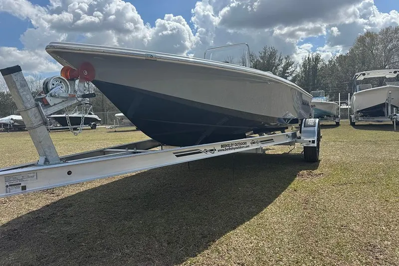 Slide: The Image of 2026 Sea Pro 172 Bay boat on trailer under cloudy sky. - 11