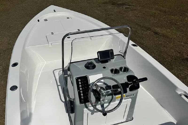 Slide: The Image of 2026 Sea Pro 172 Bay boat interior with steering console and navigation equipment. - 12