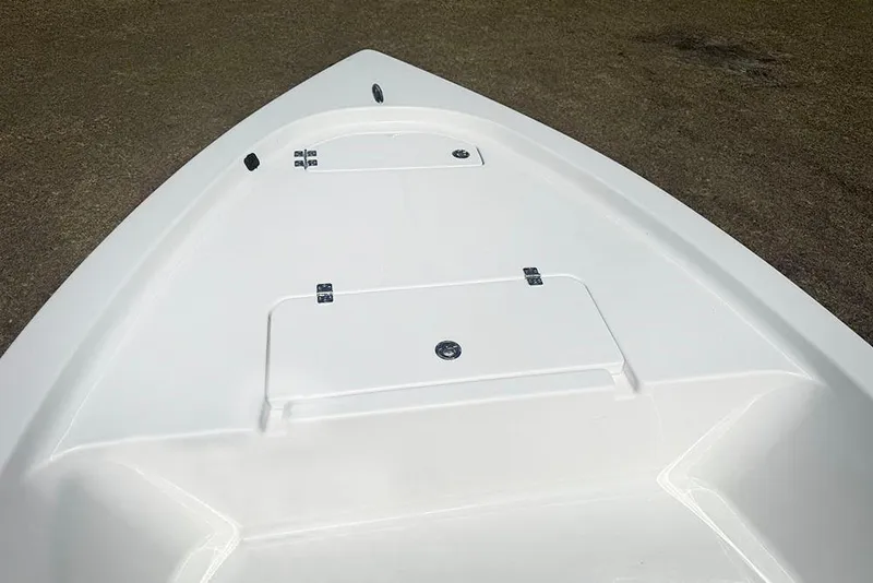 Slide: The Image of 2026 Sea Pro 172 Bay boat deck, featuring storage compartments and sleek design. - 13