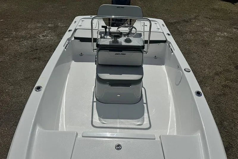 Slide: The Image of 2026 Sea Pro 172 Bay boat interior with steering console and seating. - 16