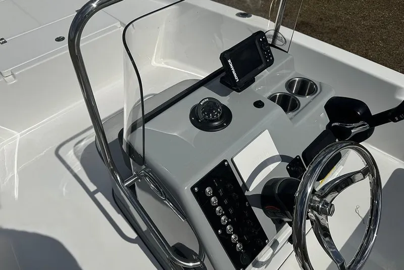 Slide: The Image of 2026 Sea Pro 172 Bay boat console with steering wheel, compass, and navigation system. - 20