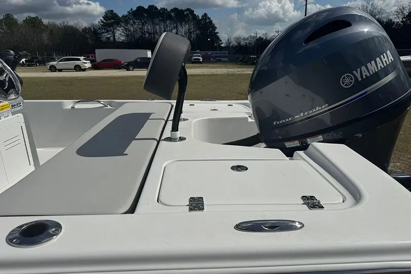 Slide: The Image of 2026 Sea Pro 172 Bay boat with Yamaha outboard motor, parked outdoors. - 30