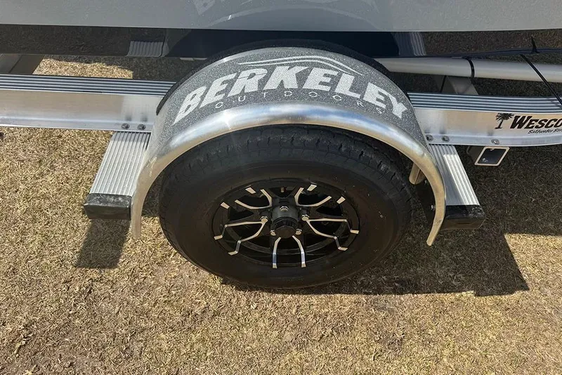 Slide: The Image of Trailer wheel of 2026 Sea Pro 172 Bay boat with Berkeley Outdoors branding. - 8