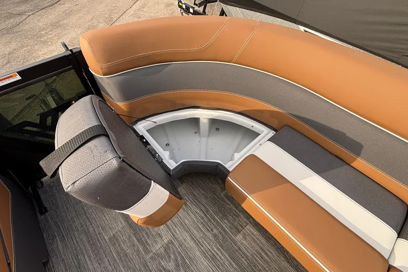 Slide: The Image of 2026 Viaggio Diamante U 26 boat seating with storage compartment, featuring brown and gray upholstery. - 20