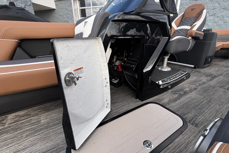 Slide: The Image of 2026 Viaggio Diamante U 26 boat interior with open storage compartment and luxurious seating. - 23