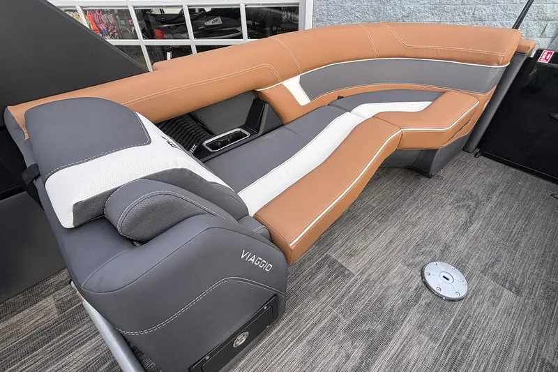 Slide: The Image of Luxurious seating on 2026 Viaggio Diamante U 26 boat, featuring elegant brown and gray upholstery. - 26