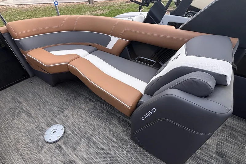 Slide: The Image of Luxurious seating on 2026 Viaggio Diamante U 26 boat, featuring brown and gray upholstery. - 27