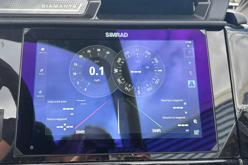 Slide: The Image of 2026 Viaggio Diamante U 26 dashboard with Simrad navigation display showing speed and heading. - 34