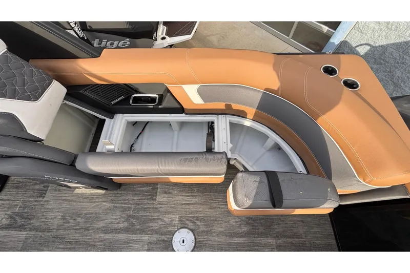 Slide: The Image of 2026 Viaggio Diamante U 26 boat interior with tan and gray seating, storage compartment open. - 37