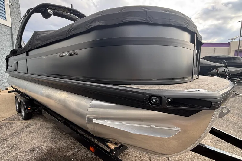 Slide: The Image of 2026 Viaggio Diamante U 26 pontoon boat on trailer, sleek black design. - 47