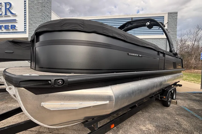 Slide: The Image of 2026 Viaggio Diamante U 26 pontoon boat on trailer, sleek black design. - 48