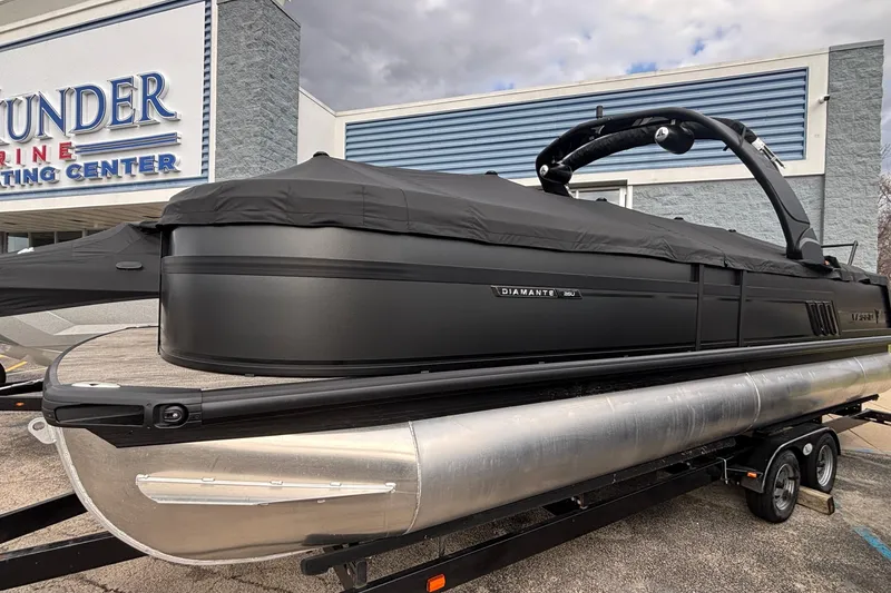 Slide: The Image of 2026 Viaggio Diamante U 26 pontoon boat with black cover at marine center. - 49