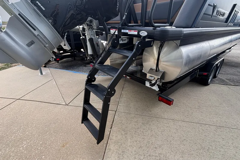 Slide: The Image of Rear view of 2026 Viaggio Diamante U 26 pontoon boat with ladder and motor. - 5