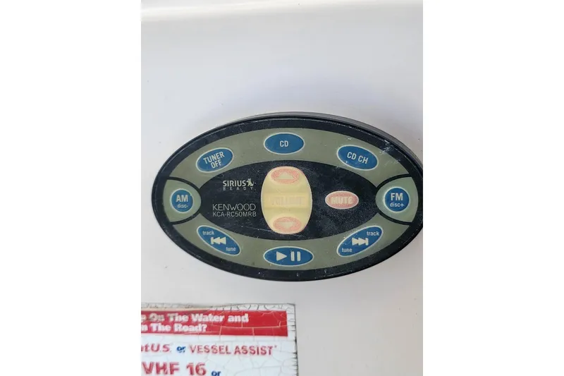 Slide: The Image of Kenwood KCA-RC50MRB marine audio control panel on 2004 Grady-White Marlin 300 boat. - 12