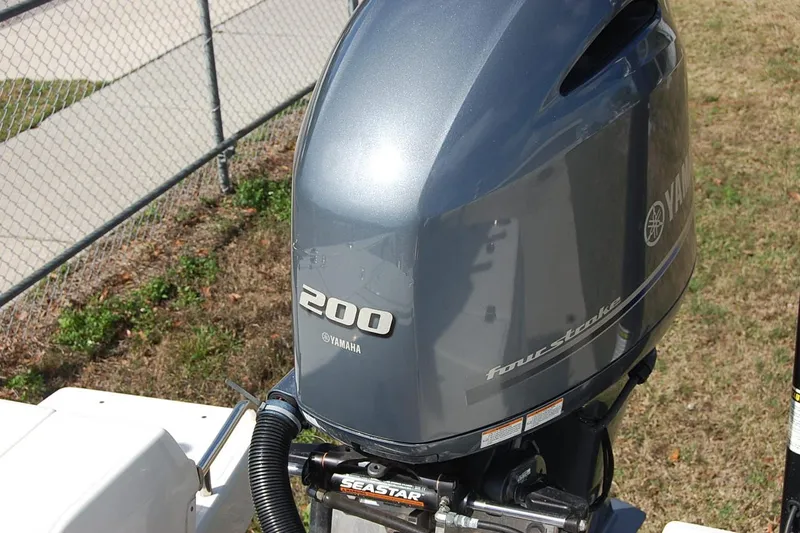 Slide: The Image of 2019 Robalo 226 Cayman with Yamaha 200 four-stroke outboard motor. - 12