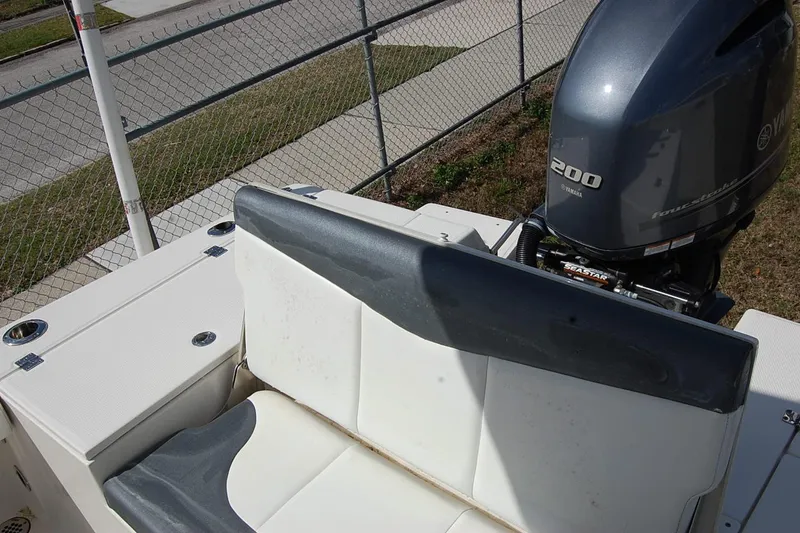 Slide: The Image of 2019 Robalo 226 Cayman boat with Yamaha 200 engine, rear seating view. - 21