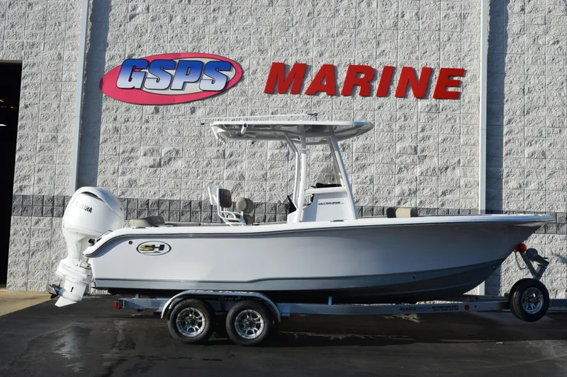 The Image of 2026 Sea Hunt Ultra 219 boat displayed at GSPS Marine dealership. - 1
