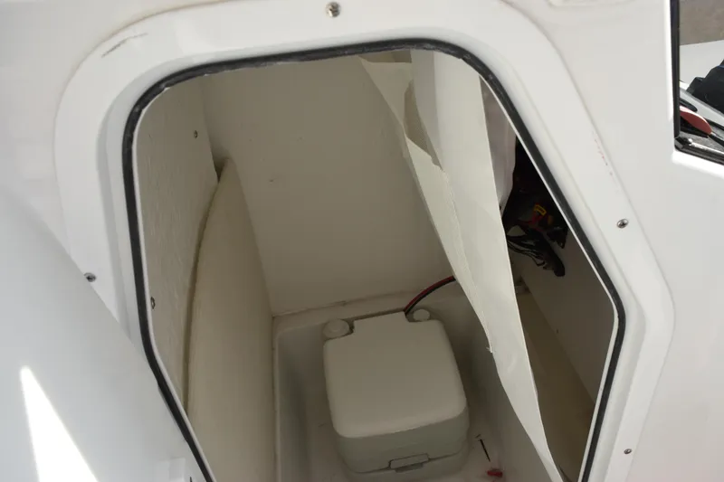 Slide: The Image of Interior storage compartment of 2026 Sea Hunt Ultra 219 boat. - 16