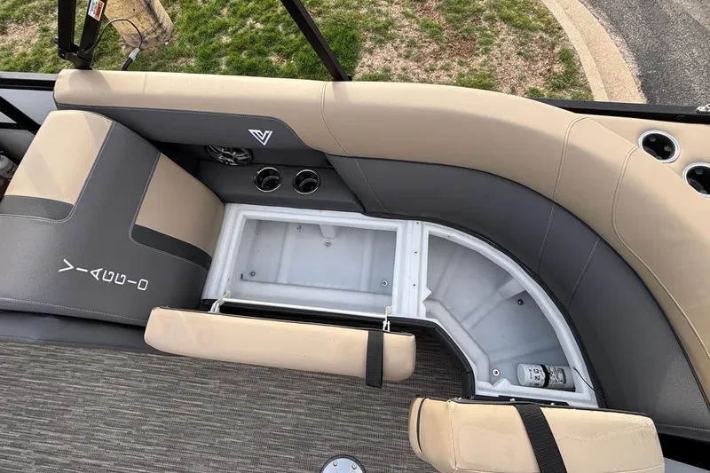 Slide: The Image of Interior seating of 2026 Viaggio Lago X24U boat with storage compartment open. - 10