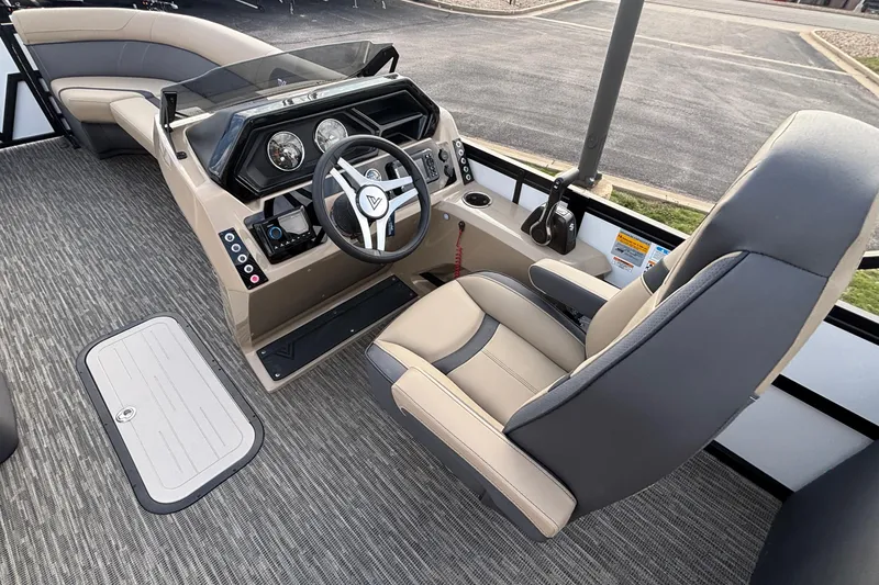 Slide: The Image of Interior of 2026 Viaggio Lago X24U boat with modern steering console and seating. - 17