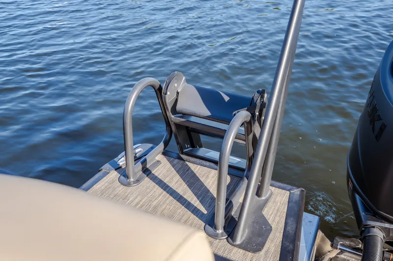 Slide: The Image of Boat ladder on Viaggio Lago X24U, 2026 model, by the water. - 8