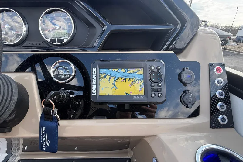 Slide: The Image of Dashboard of 2026 Viaggio Lago X24U boat with navigation system and controls. - 21