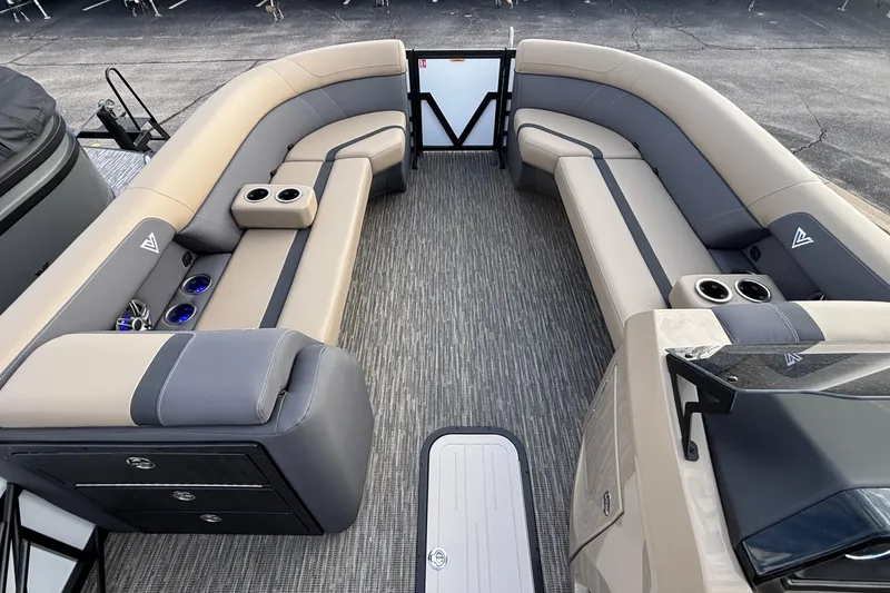 Slide: The Image of Luxurious interior of 2026 Viaggio Lago X24U pontoon boat with plush seating and cup holders. - 22