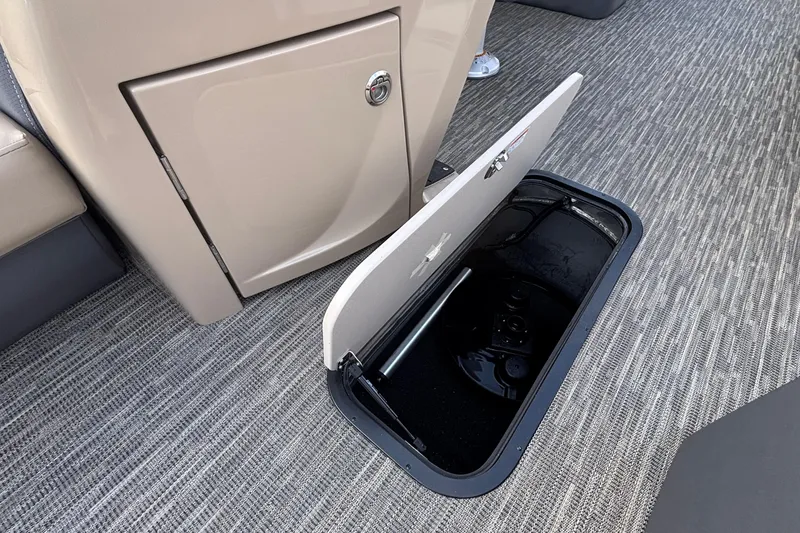 Slide: The Image of Open storage compartment in 2026 Viaggio Lago X24U boat interior. - 29
