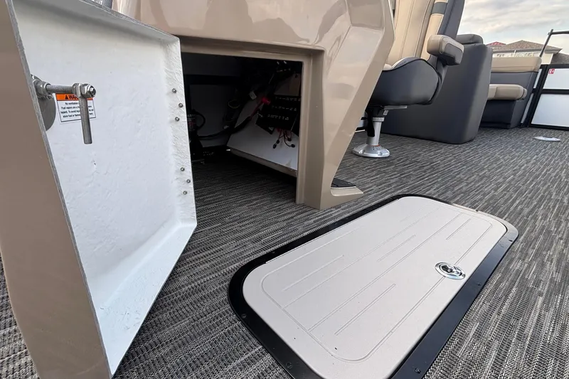 Slide: The Image of Interior view of 2026 Viaggio Lago X24U boat, featuring open storage compartments and seating. - 30