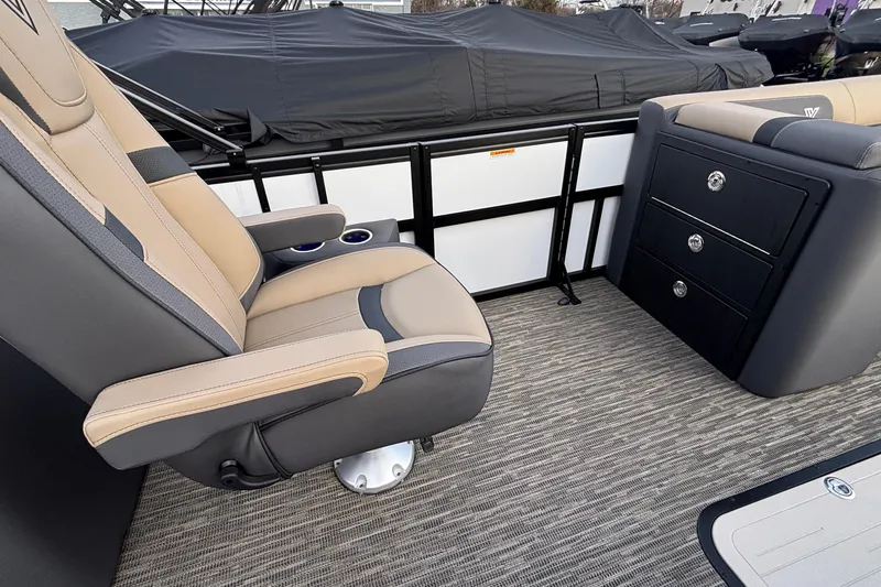Slide: The Image of Interior of 2026 Viaggio Lago X24U boat with luxurious seating and storage drawers. - 31